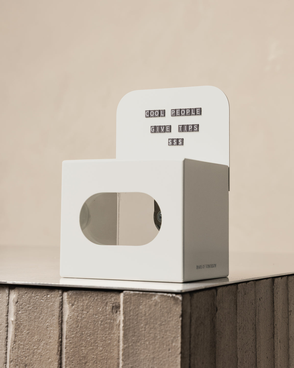 White FOLD Tip Box with a magnetic message displayed on a tiled counter
